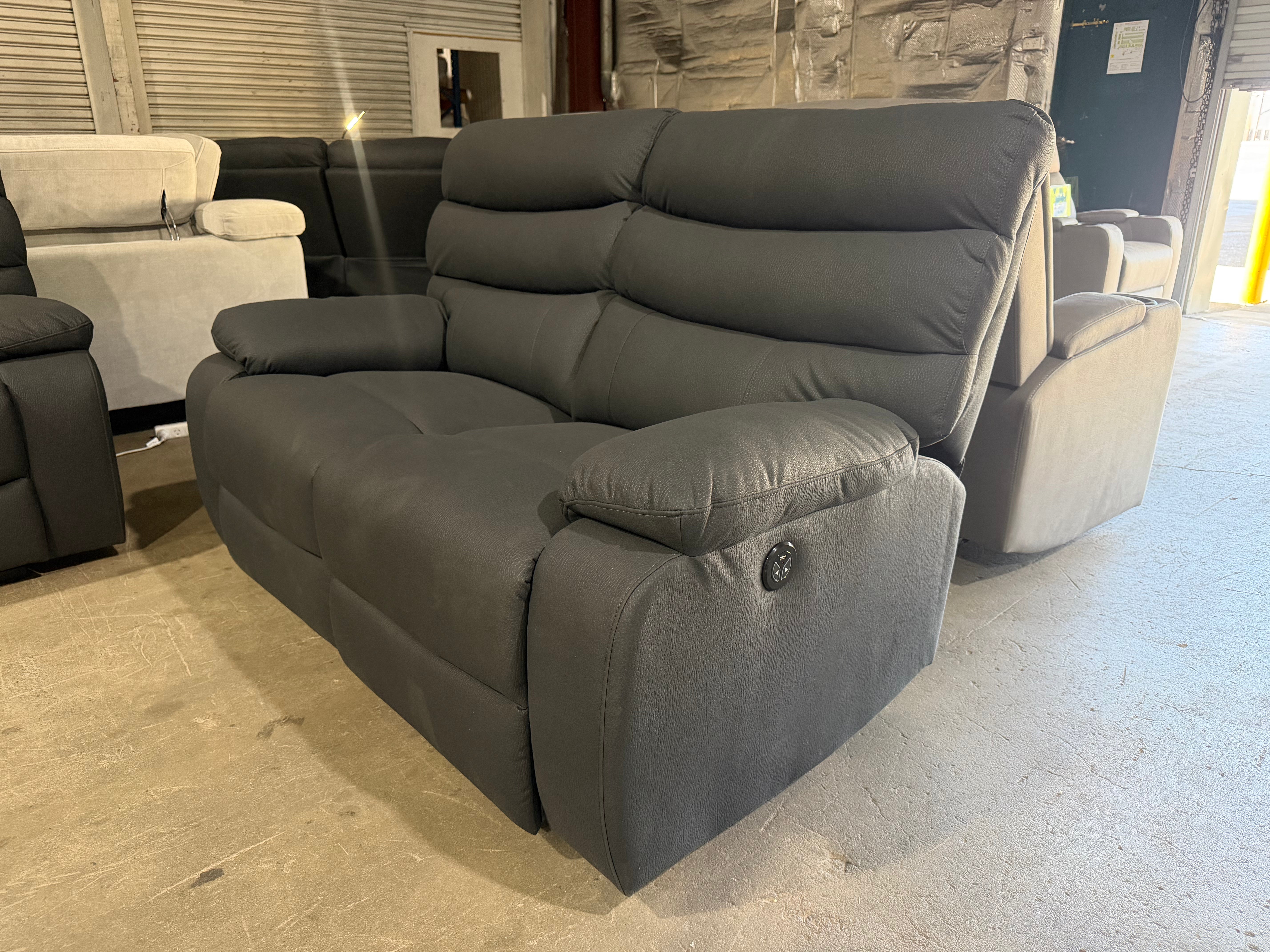 Noosa 2 seater with in built electric recliners in Charcoal rhino suede